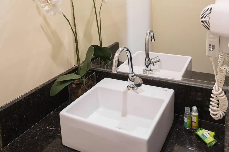 Banheiro em Olavo Bilac Hotel (Taubaté)