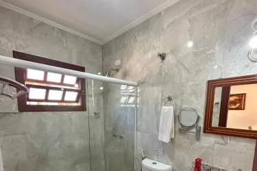 Banheiro em Pousada Aldeia Manacas (São Bento do Sapucaí)