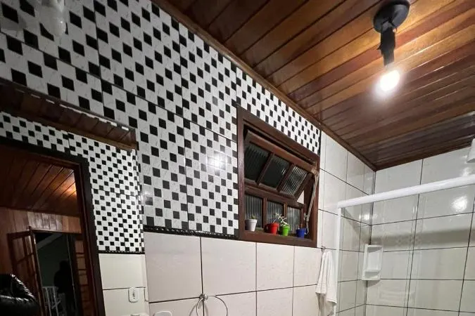 Banheiro em Pousada Araucaria Suites (Campos do Jordão)