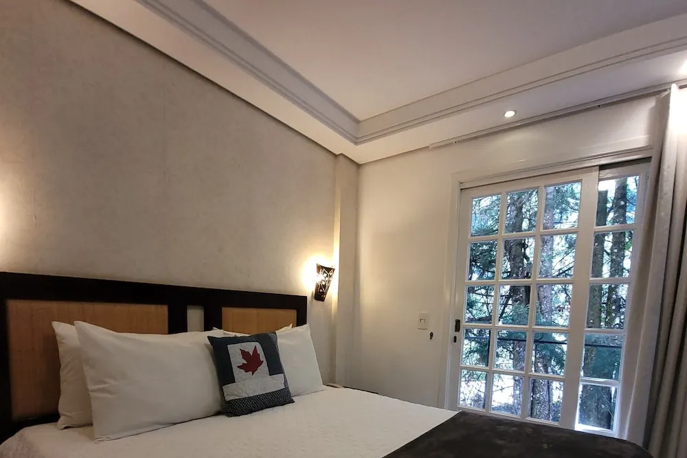 Quarto em Pousada Cheverny (Campos do Jordão)