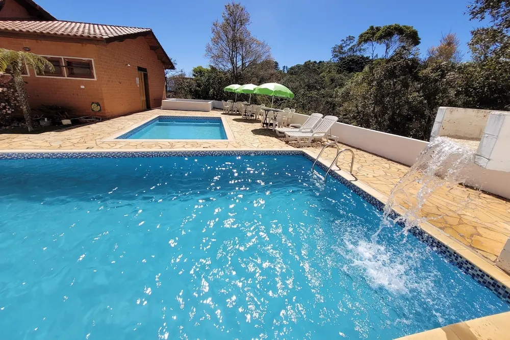 Pousada Cravo & Canela: piscina, em Campos do Jordão