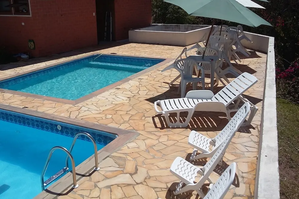 Pousada Cravo & Canela: piscina, em Campos do Jordão