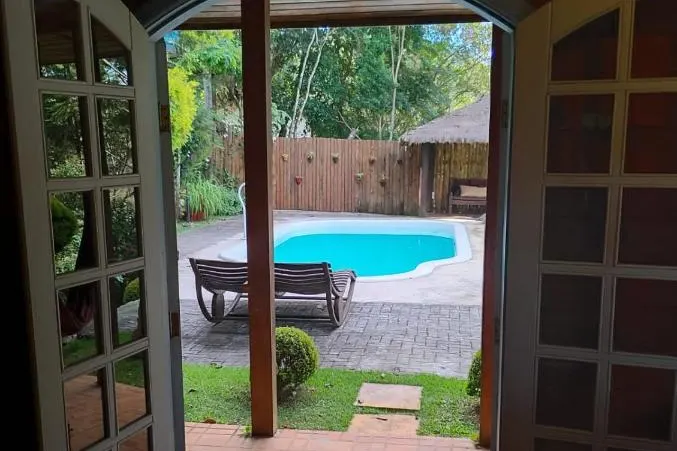 Pousada Pássaro de Fogo: piscina, em Santo Antônio do Pinhal