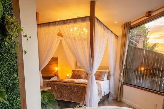 Banheiro em Pousada Recanto Dos Moinhos (Campos do Jordão)