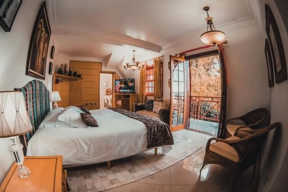 Quarto em Pousada Vila Natal - Art Gallery (Campos do Jordão)