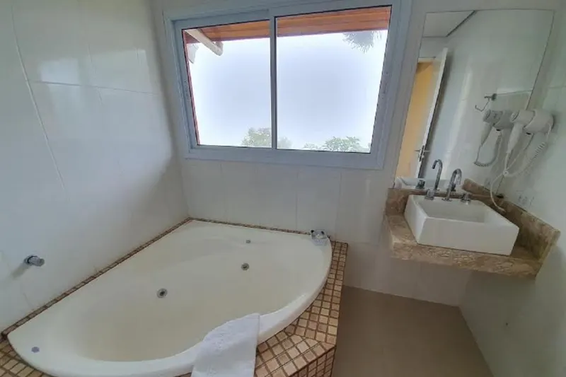 Banheiro em Pousada Villa Hegus (Campos do Jordão)