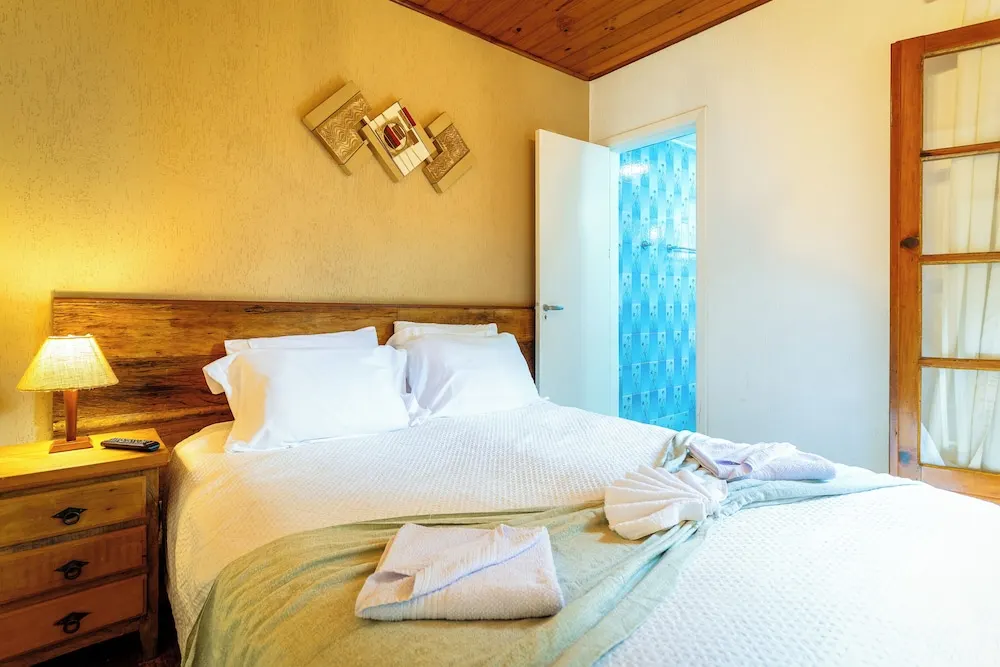 Quarto em VELINN Pousada Vila Floratta (Campos do Jordão)