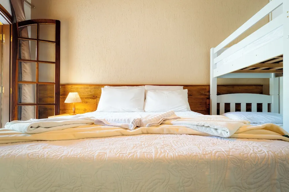 Quarto em VELINN Pousada Vila Floratta (Campos do Jordão)